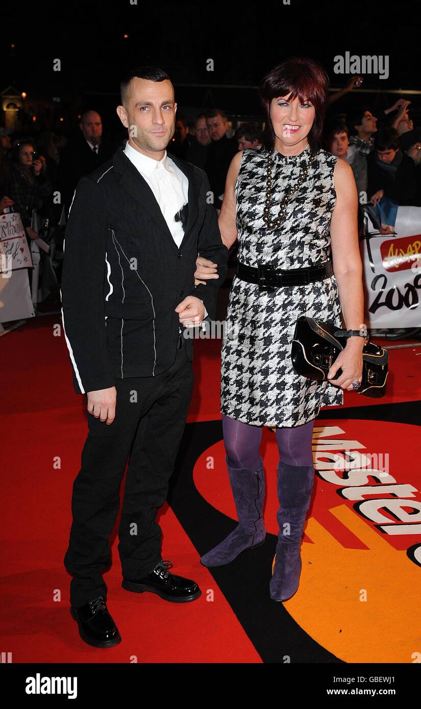 Janet Street Porter and guest arriving for the BRIT Awards, at Earls Court, central London, SW5. Stock Photo