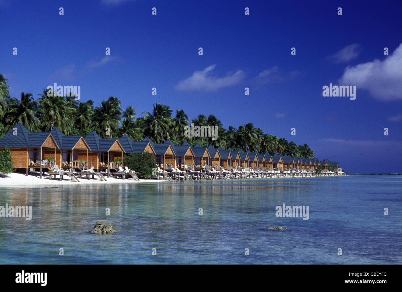 bungalow at the seascape of the island and atoll of the Maldives Islands in the indian ocean. Stock Photo