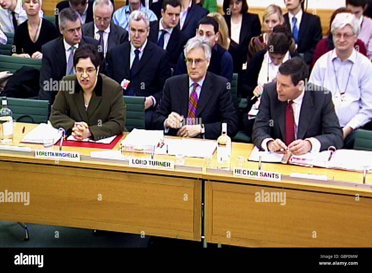(left to right) Chief Executive of the Financial Services Compensation Scheme Loretta Minghella, Chairman of the FSA Lord Turner and Chief Executive Officer of the FSA give evidence at the Treasury Committee meeting on the Banking Crisis inside the Wilson Room, Portcullis House, central London. Stock Photo
