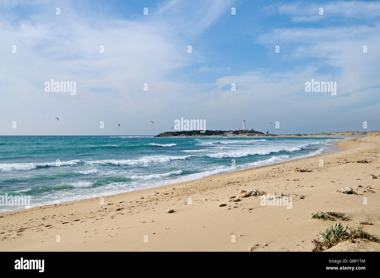 Playa de Canos de Meca, beach, kitesurfers, Cabo de Trafalgar at the back, lighthouse, Barbate, Province of Cadiz, Andalusia, Costa de la Luz, Spain, Europe Stock Photo