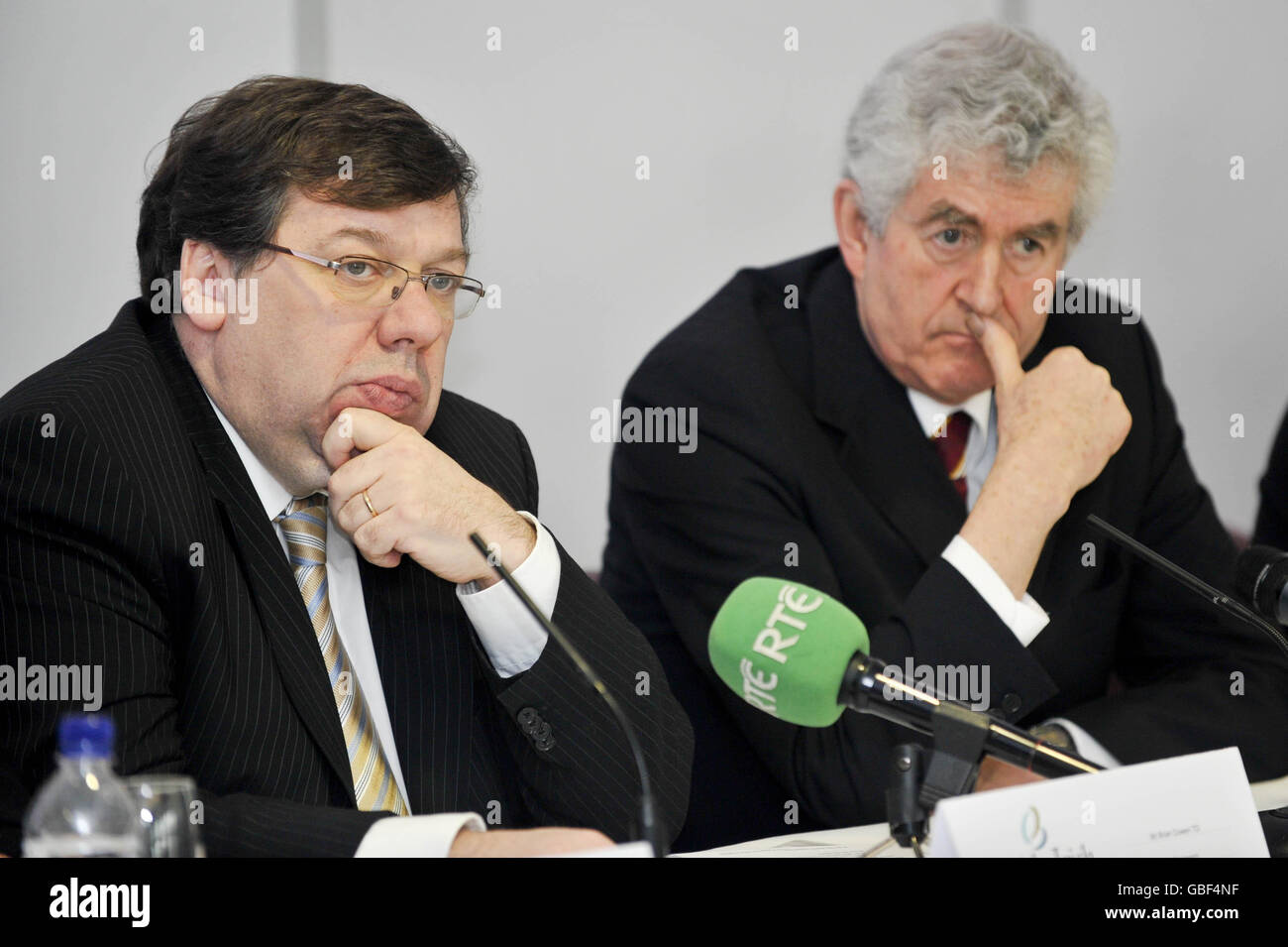Taoiseach of Ireland Brian Cowen (left) and Welsh First Minister Rhodri Morgan listen to questions during a press conference at the British-Irish council meeting in the Swalec Stadium, Cardiff, Wales. Stock Photo