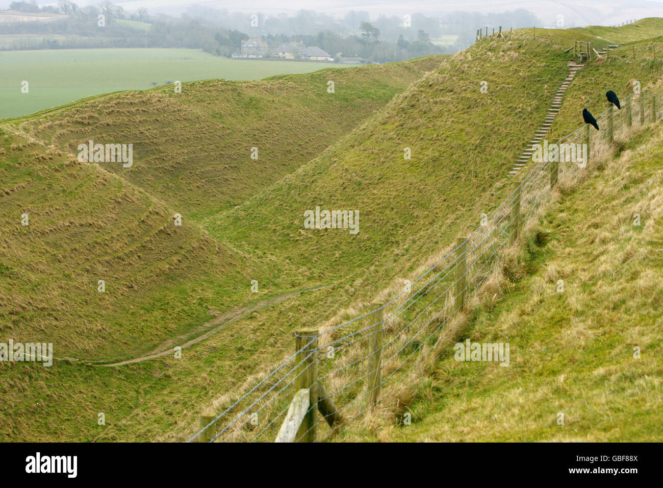 Maiden Castle near Dorchester, Dorset. It is the largest and most complex Iron Age hill fort in the UK. Stock Photo