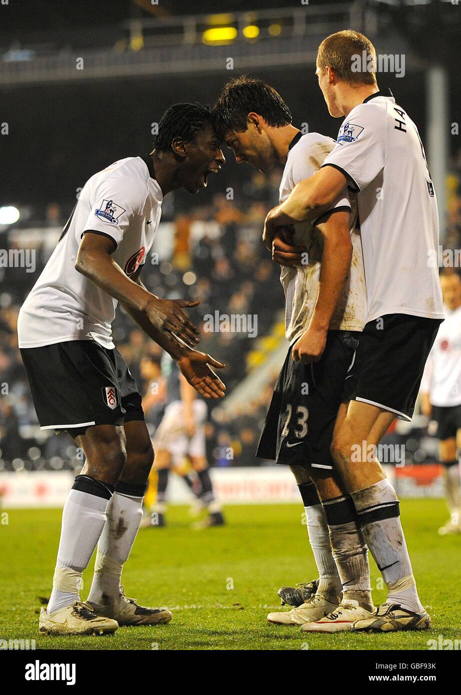 Fulham's Clint Dempsey (right) celebrates after scoring the opening goal of  the game with his team-mate Eddie Johnson (left Stock Photo - Alamy