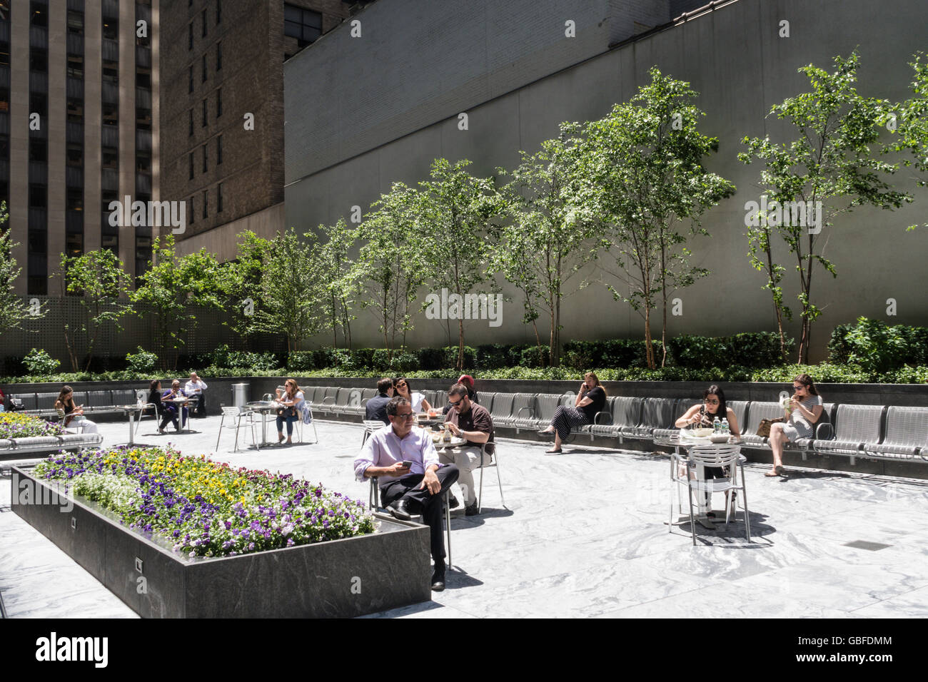 Public Space at lunchtime, West 57th Pocket Park, NYC, USA Stock Photo
