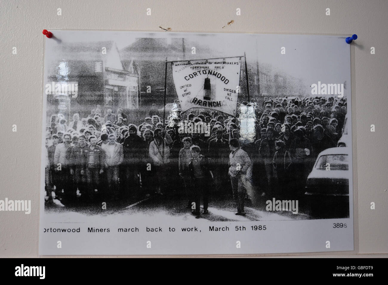 A photograph pinned on the Miners Welfare Club wall dating back to 1985 when the miners marched back to work with the NUM Branch Banner they carried through the Miners strike. The threatened closure of Cortonwood sparked the year long miners strike which marks its 25th Anniversary this month. Stock Photo