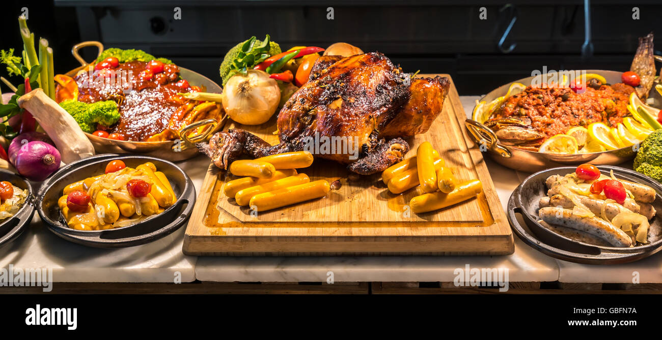 Carving meat station in buffet line Stock Photo - Alamy
