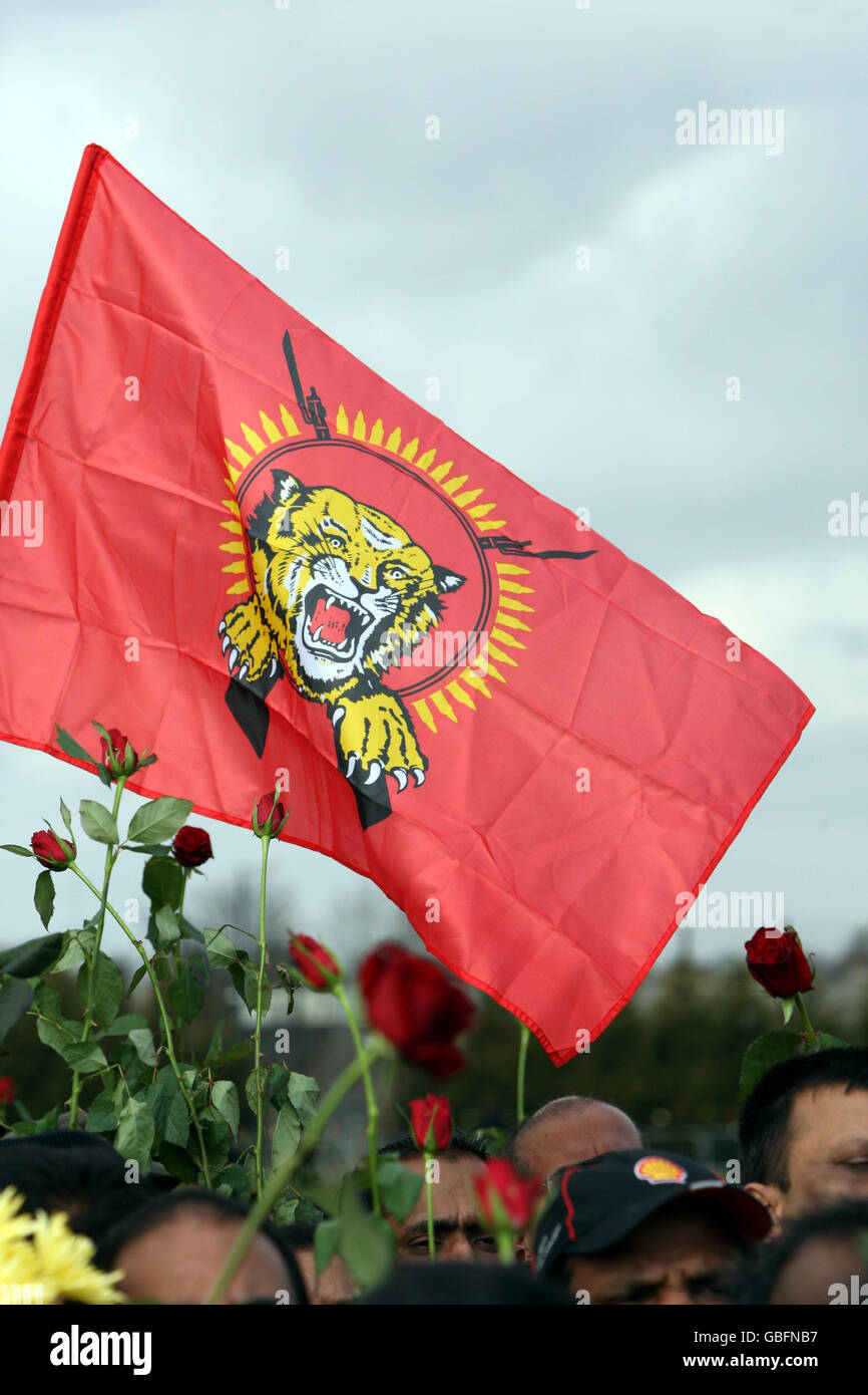 A 'Tamil Tigers' flag is flown during the funeral of Murugathasan Varnakulasingham 26, from London, at the Shree Kutch Leva Patel Sports and Community Centre in Northolt, Middlesex. Stock Photo