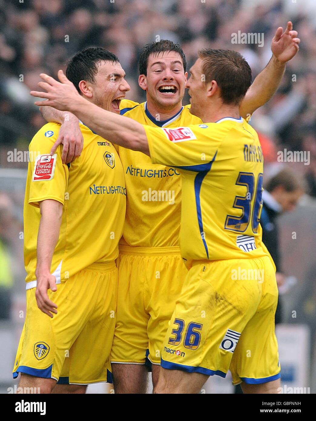 Leeds United's Robert Snodgrass (left) celebrates scoring his sides second goal with teammates Ben Parker (centre) and Richard Naylor (right) Stock Photo