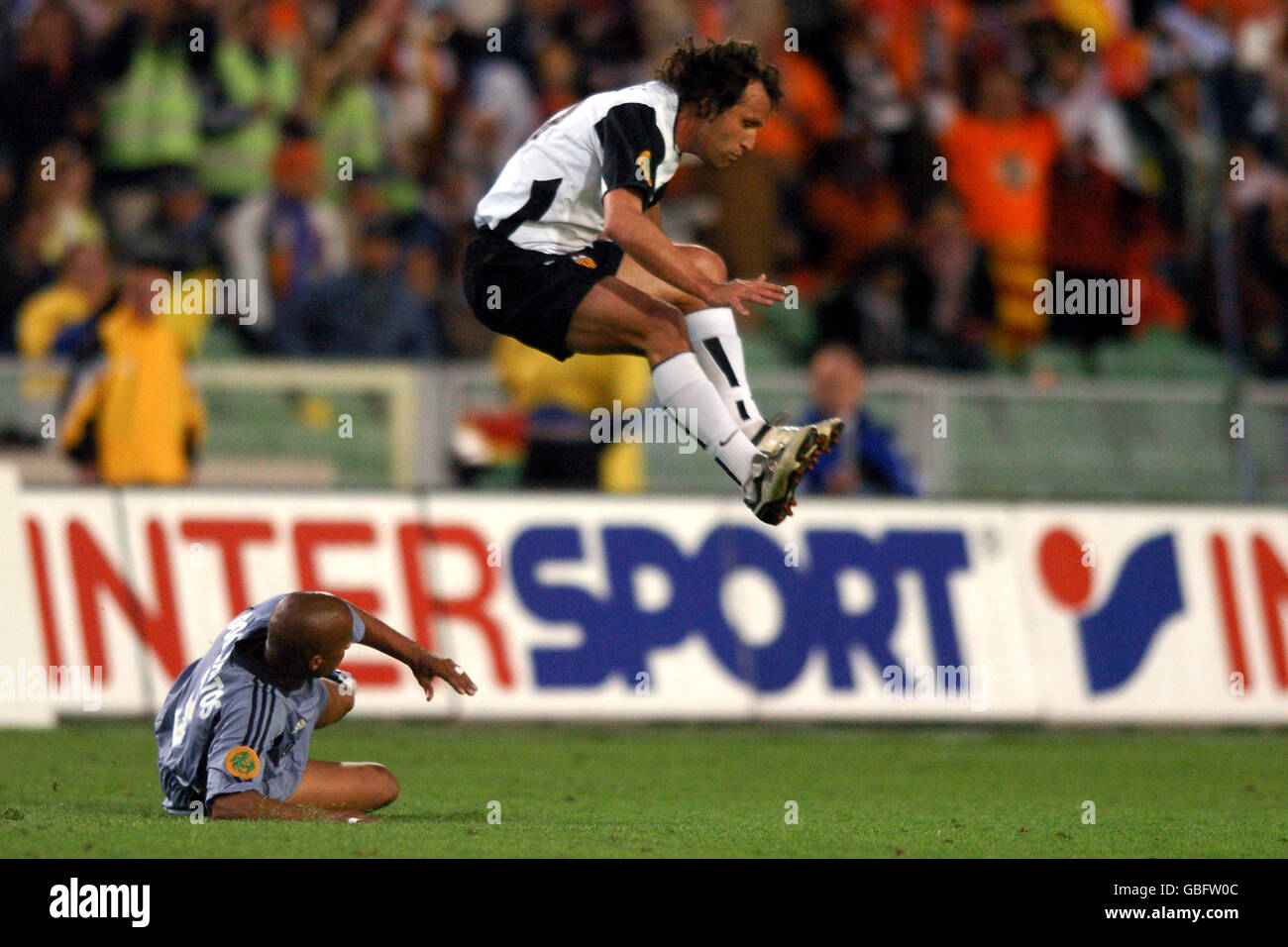 Valencia's Francisco Rufete evades the challenge by Olympique Marseille's Manuel Dos Santos (l) Stock Photo