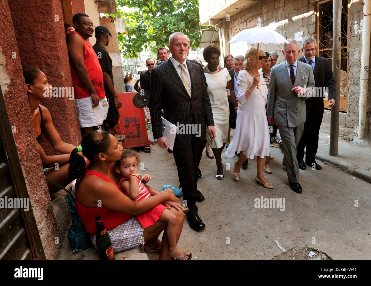 The Prince of Wales and the Duchess of Cornwall tour a favela (shanty town) on the outskirts of Rio de Janeiro,in Brazil. Stock Photo