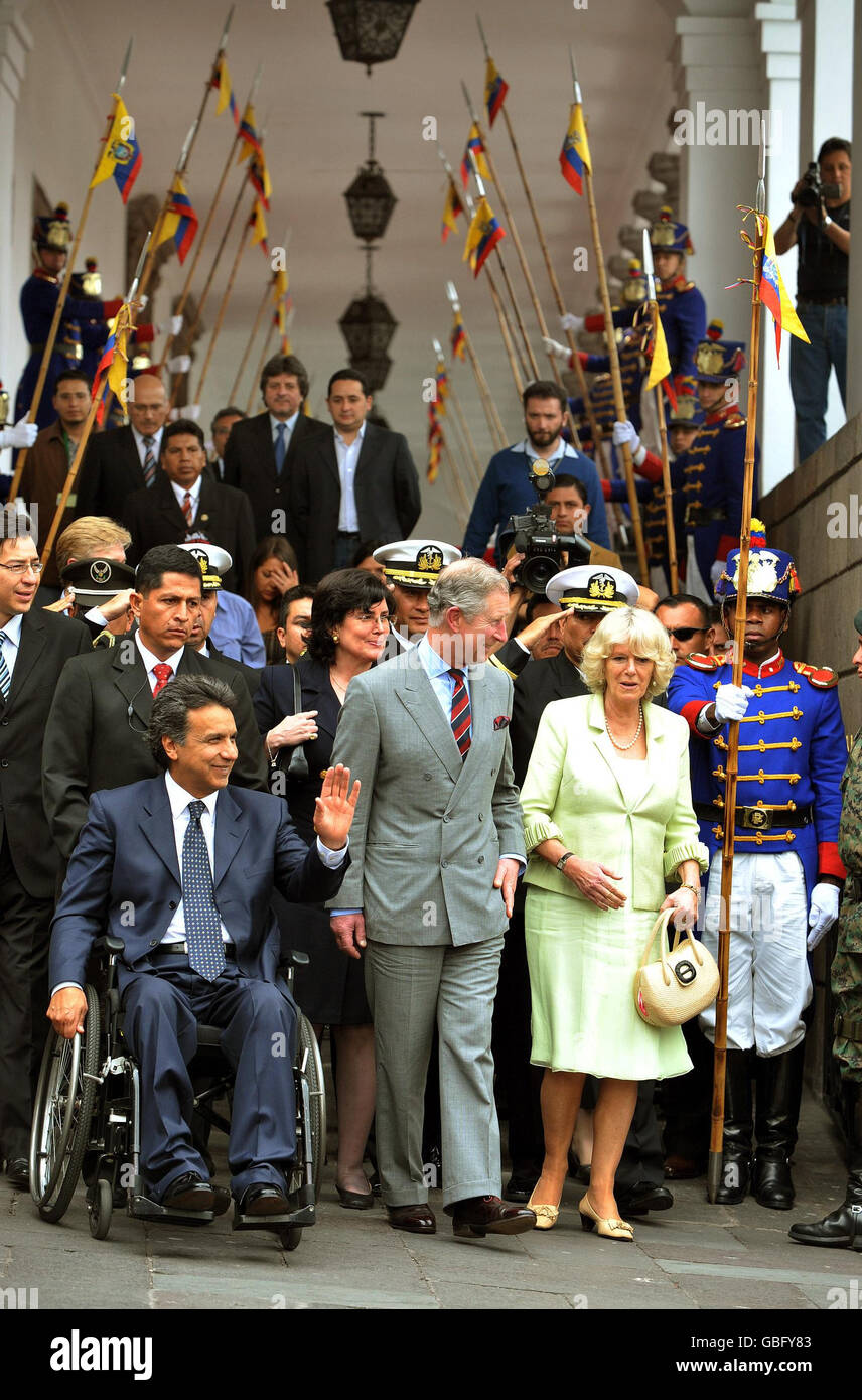 The Prince of Wales and the Duchess of Cornwall with the Vice President of Ecuador Lenin Moreno (left, in wheelchair), as they leave the Presidential Palacein Quito. Stock Photo