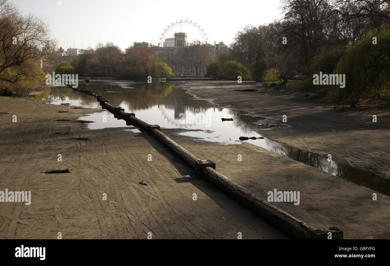 St James's Park drained. A view of the drained lake to improve water quality in St James's Park in London. Stock Photo