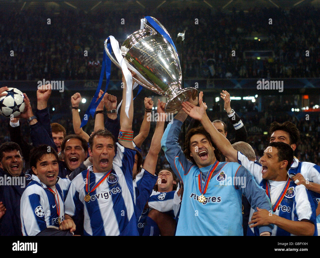 Porto players celebrate as they lift the trophy after beating