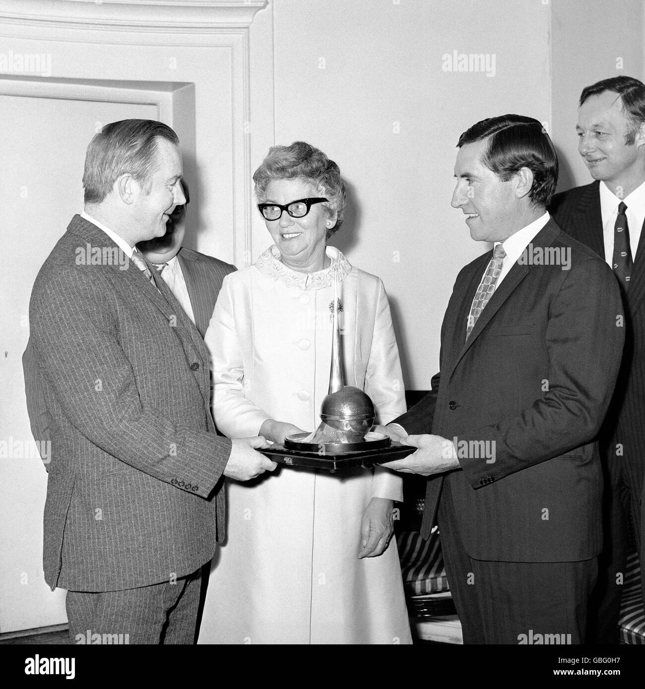 Mary Whitehouse, 'Clean Up TV' campaigner, and her National Viewers and Listeners Association, paying tribute to the BBC. She is seen in the centre as Bryan Cowgill, left, head of BBC Sports, received from Frank O'Farrell, manager of Manchester United, the annual TV award by the association. It was awarded to the BBC for its sports programmes. Stock Photo