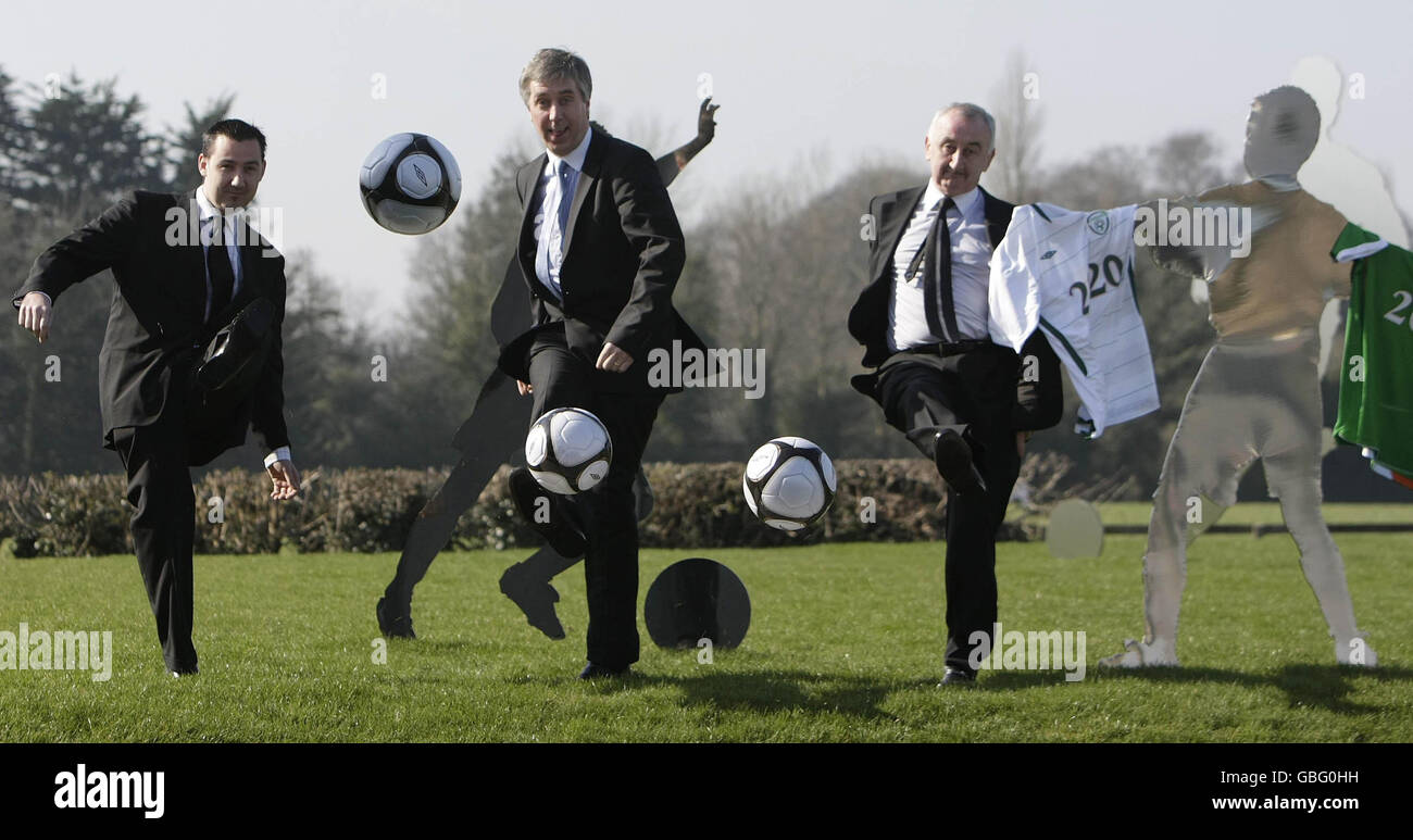 John Courtney MD of Umbro (right), John Delaney CEO of the Football  Association of Ireland and Jonathan Courtney, Director of football for Umbro  (left) announce a 25.6 million euro, ten year commercial