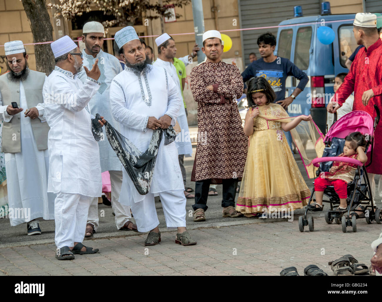 Rome, Italy. 06th July, 2016. The Bengali community celebrates  inTorpignattara multi ethnic neighborhood the end of Ramadan and expresses  condolences to the relatives of the Bangladeshi community of Italian  victims of Dhaka. ©, image size:1300x1028