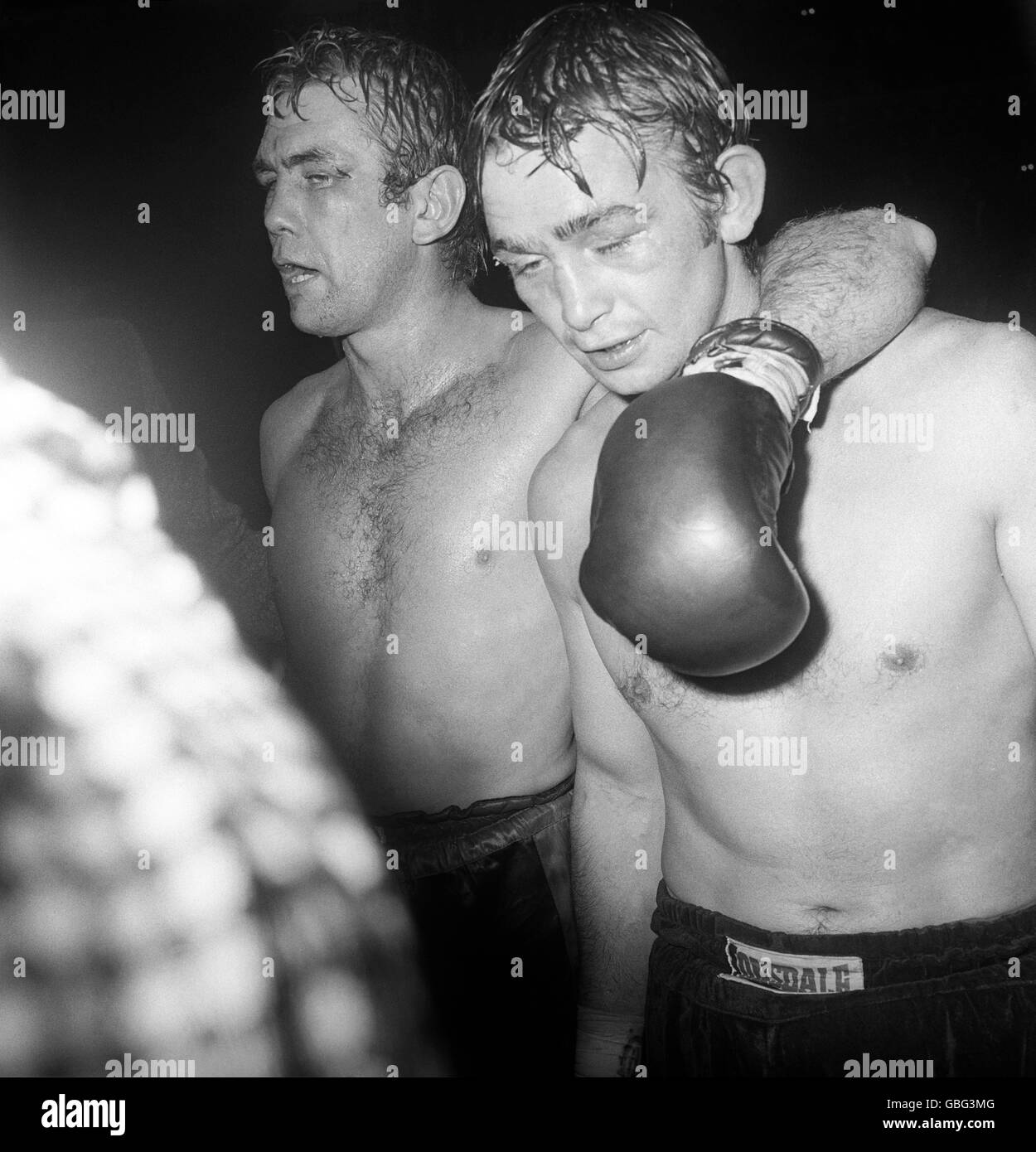 Chris Finnegan (left) puts an arm around Johnny Frankham after beating