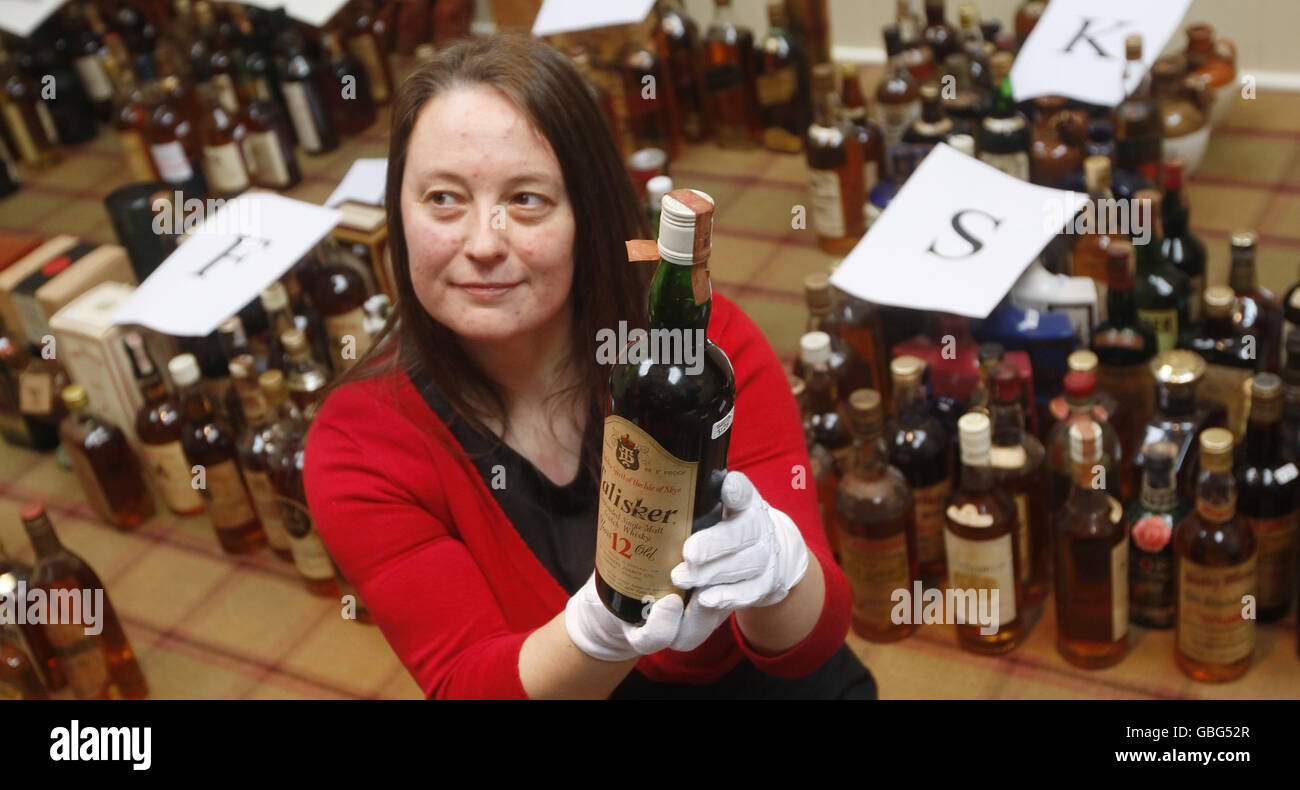 Diageo's Heritage Manager Christine McCafferty with a bottle from the worlds largest collection