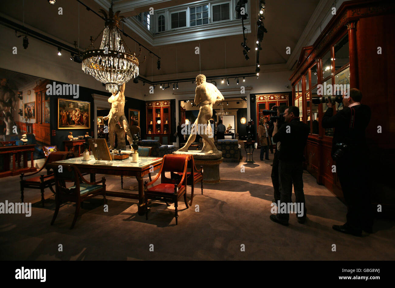 Photographers shoot items owned by Gianni Versace, from his Lake Como