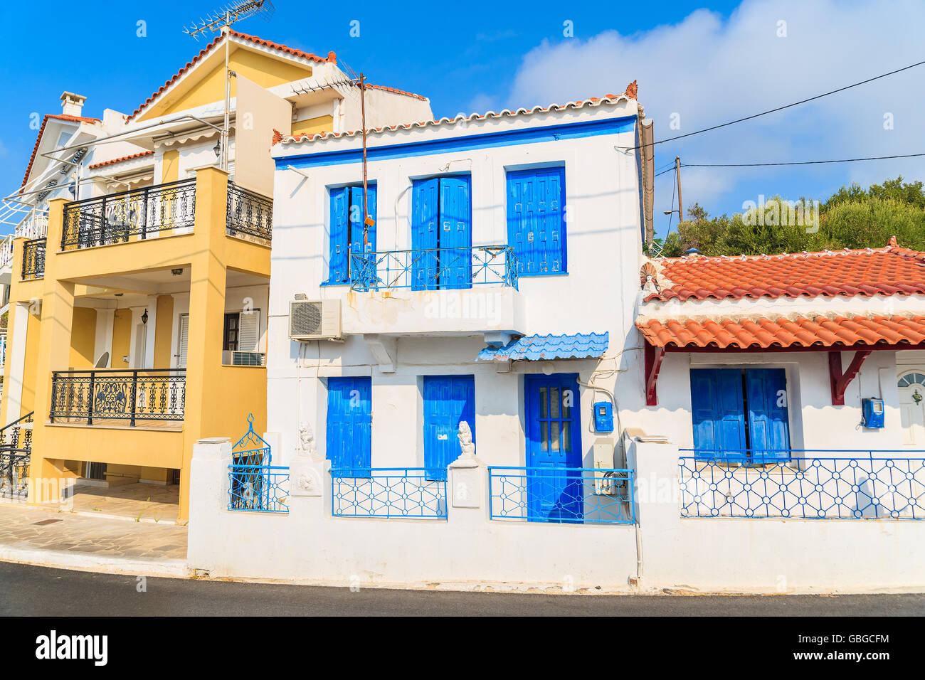 Typical Greek style houses on street of Pythagorion town, Samos island, Greece Stock Photo