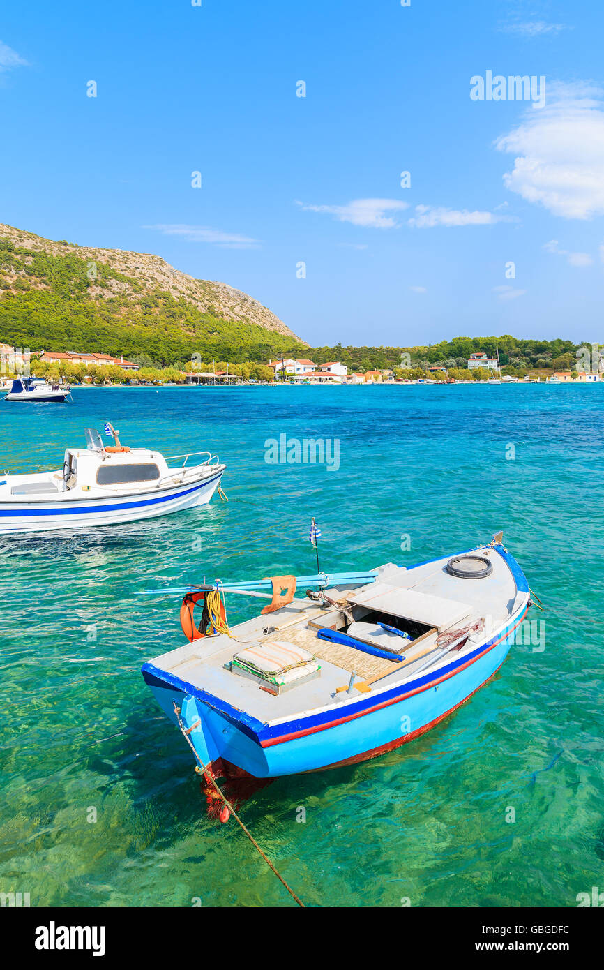 Greek fishing boats on turquoise sea water in Posidonio bay, Samos island, Greece Stock Photo