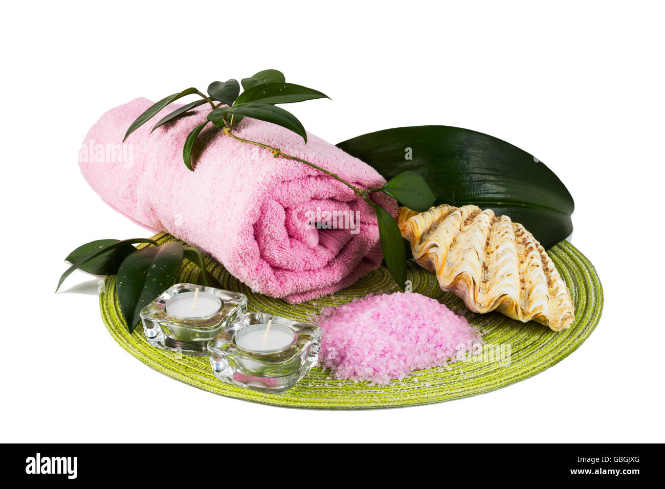 Spa concept with pink sea salt and candles. Spa. Spa treatment. Spa massage. Spa stones. Wellness spa. Spa concept. Spa still li Stock Photo
