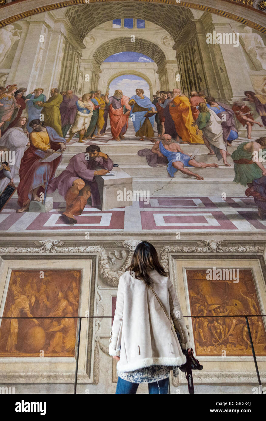 Rome. Italy. Visitor admiring the 'School of Athens' in the Raphael Rooms, Stanza della Segnatura, Vatican Museums. Stock Photo
