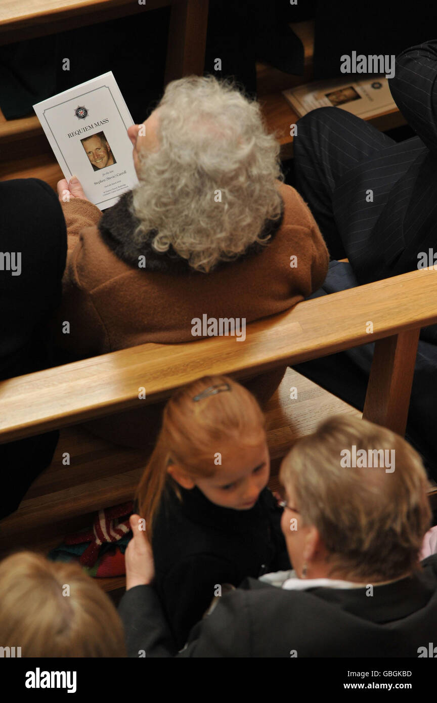 Mourners in St Therese's Church in Banbridge for the funeral of PSNI