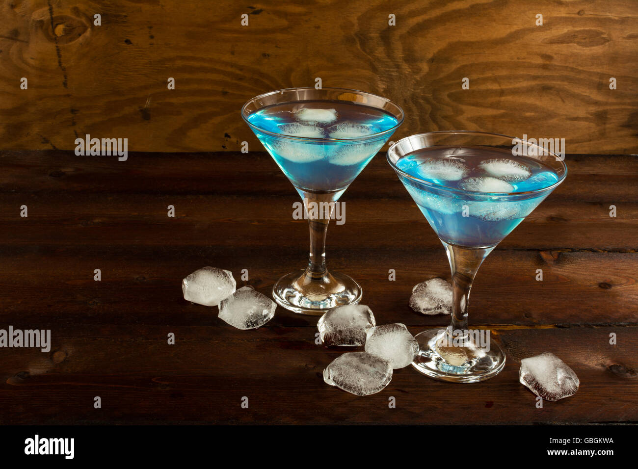 Blue Curacao liqueur served in Martini glass. Blue cocktail. Blue Martini. Blue Hawaiian cocktail. Blue curacao liqueur. Blue ma Stock Photo