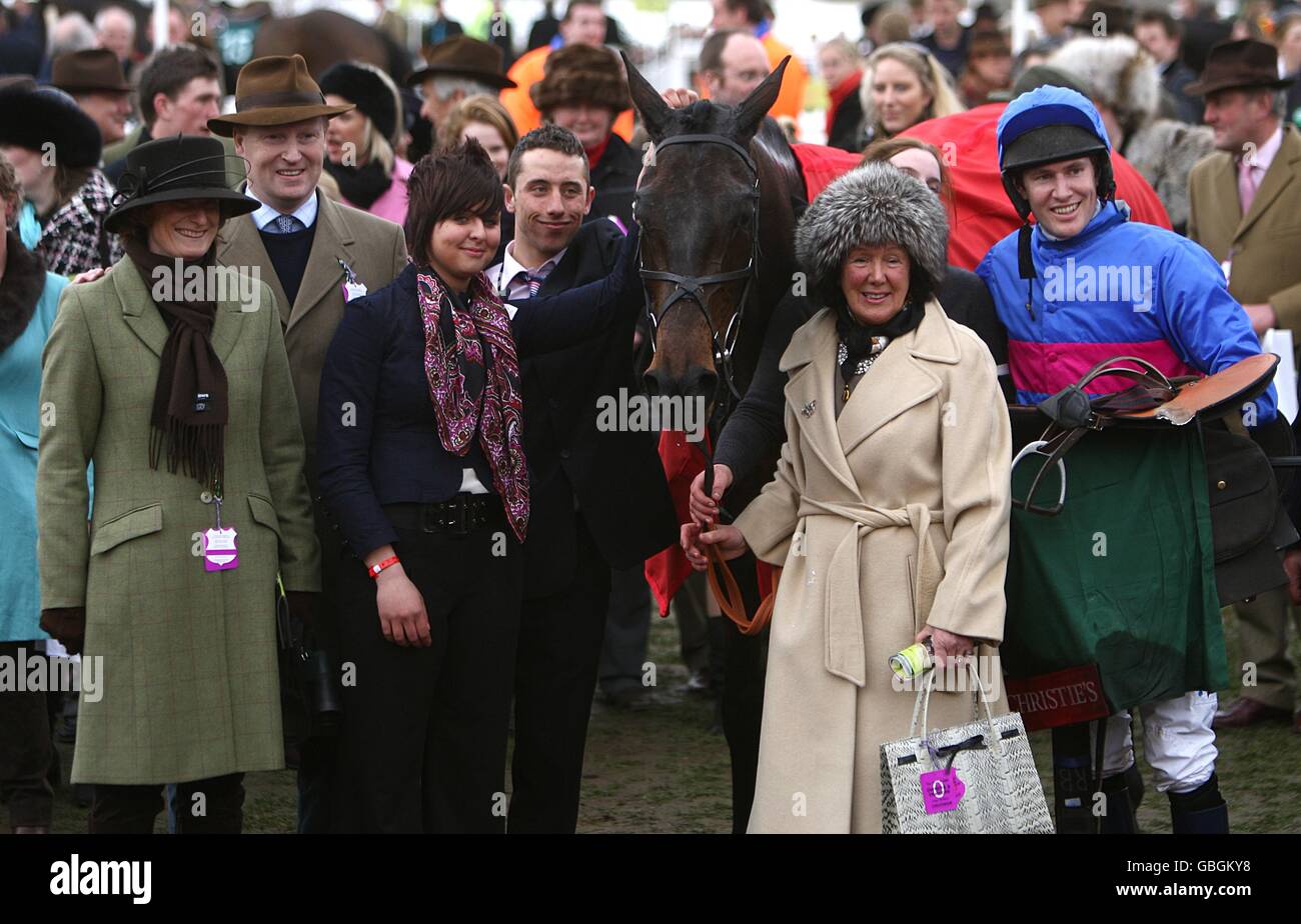 Jockey Richard Burton (rigtht) after winning the Christie's Foxhunter Chase Challenge Cup with Cappa Bleu. Stock Photo