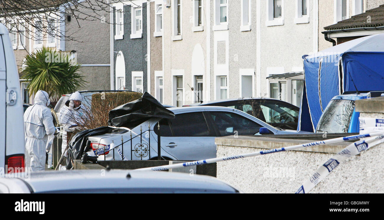 Gardai at the scene where Shay O'Byrne, 27 was shot and killed in the Tymon North park area of Tallaght, Dublin, last night. Stock Photo