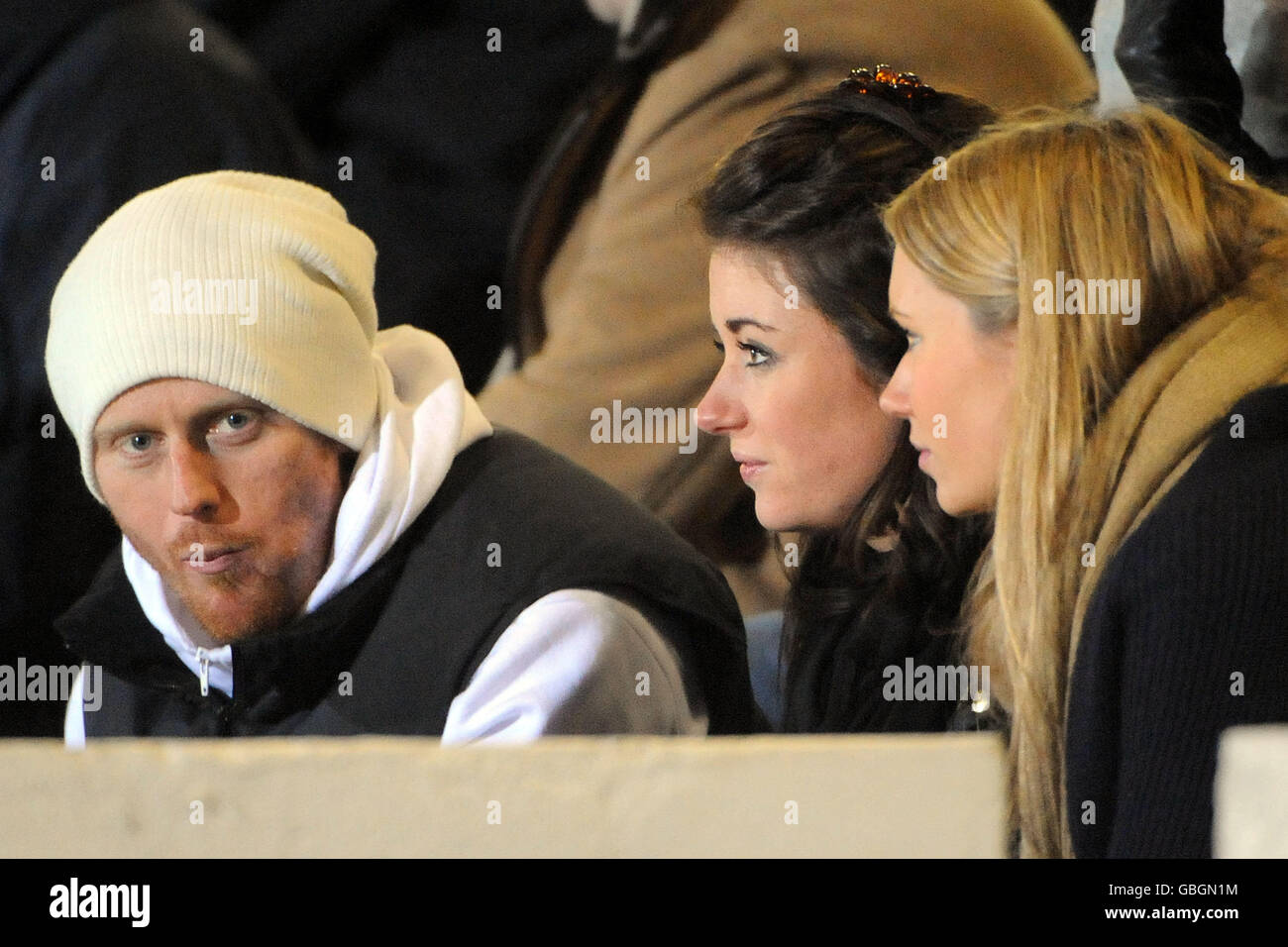 Rugby Union - Scotland Club v Ireland Club - Myreside. Scottish footballer Michael Stewart (left) watches on in the stands during the match at Myreside, Edinburgh Stock Photo