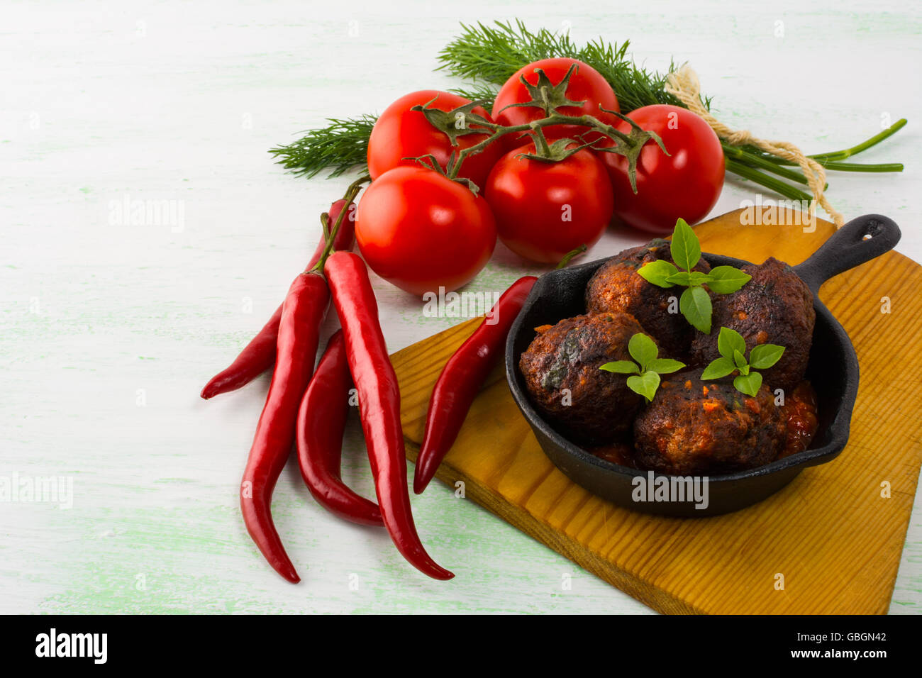 Meatballs in a cast iron skillet. Meatloaf. Grilled meatballs. Meatballs. Stock Photo