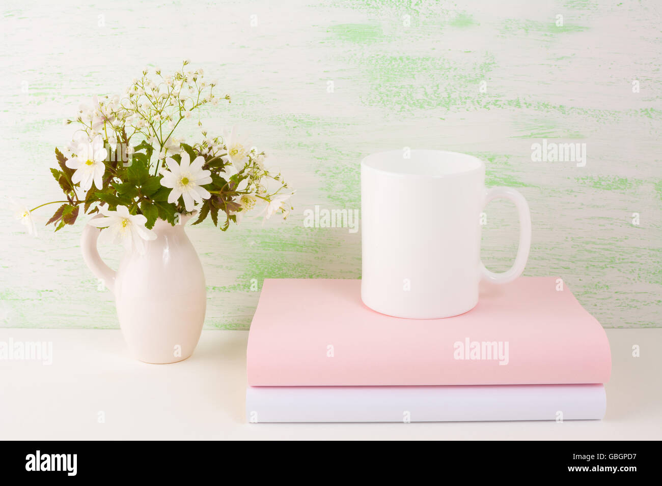 Mug mockup with fresh flowers. Mug mockup. Coffee cup template. Coffee