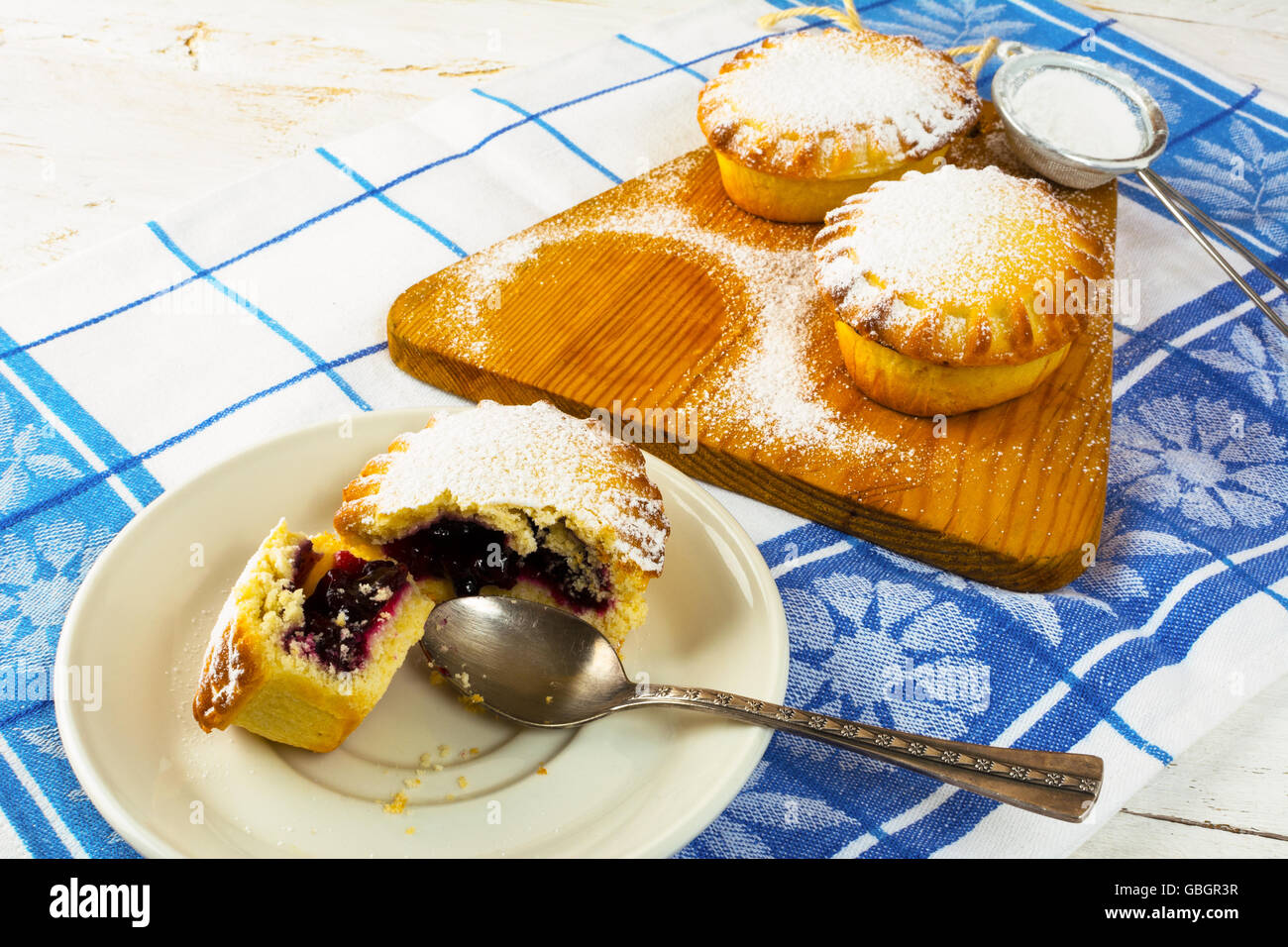 Sweet pie on the white plate. Sweet dessert. Sweet pastry. Small pie