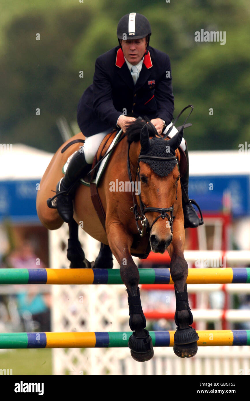 Equestrian - Showjumping - The Royal Windsor Horse Show. Portofino ridden by Michael Whitaker Stock Photo