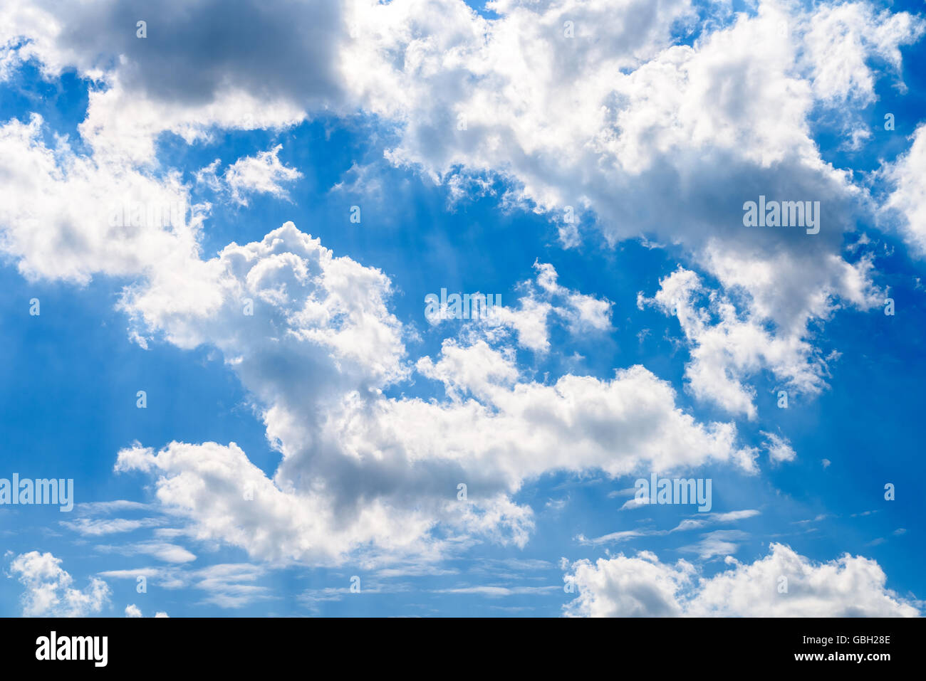 White Cumulus Clouds On Blue Sky Stock Photo - Alamy