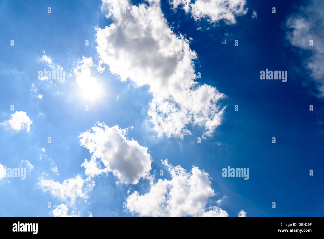 White Cumulus Clouds On Blue Sky Stock Photo - Alamy
