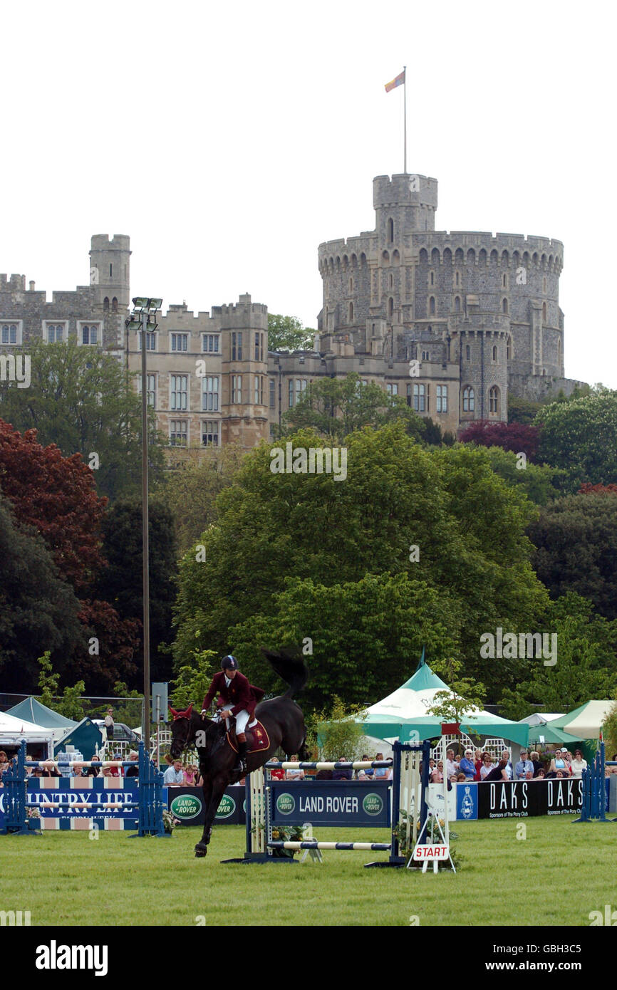 Equestrian - Showjumping - The Royal Windsor Horse Show. Action from the Windsor Horse Show, Home Park, Windsor Castle Stock Photo