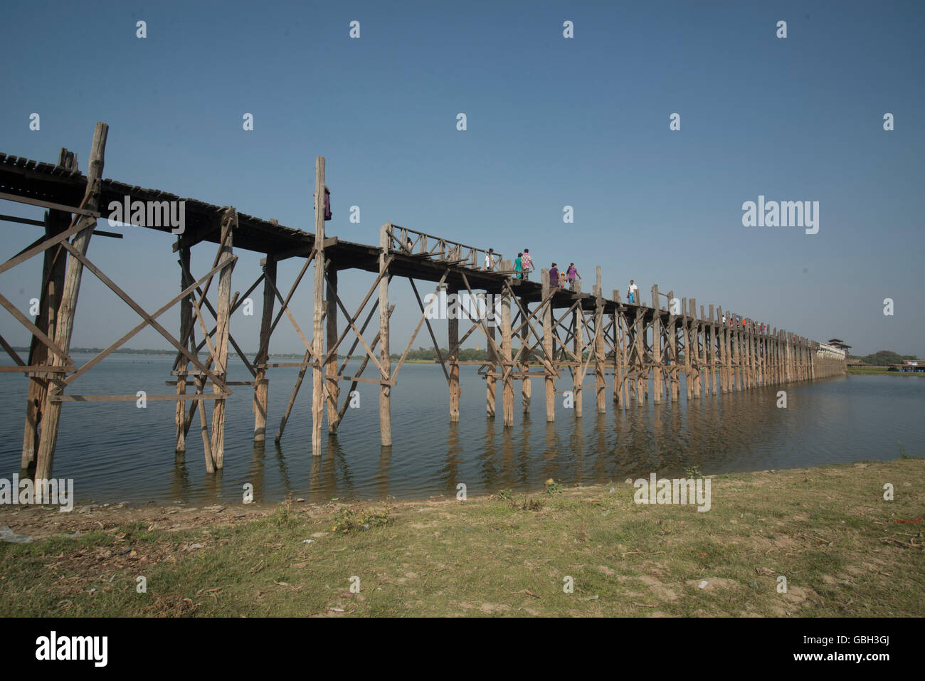 the u bein bridge in Amarapura near the City of Mandalay in Myanmar in ...
