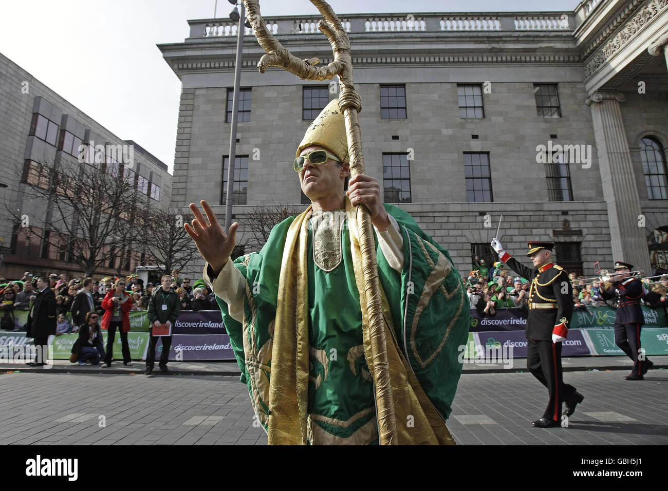 A man dressed as a Robert De Niro themed, St Patrick, leads Dublin's St Patricks Day Parade through the streets of Dublin during the annual celebrations. Stock Photo