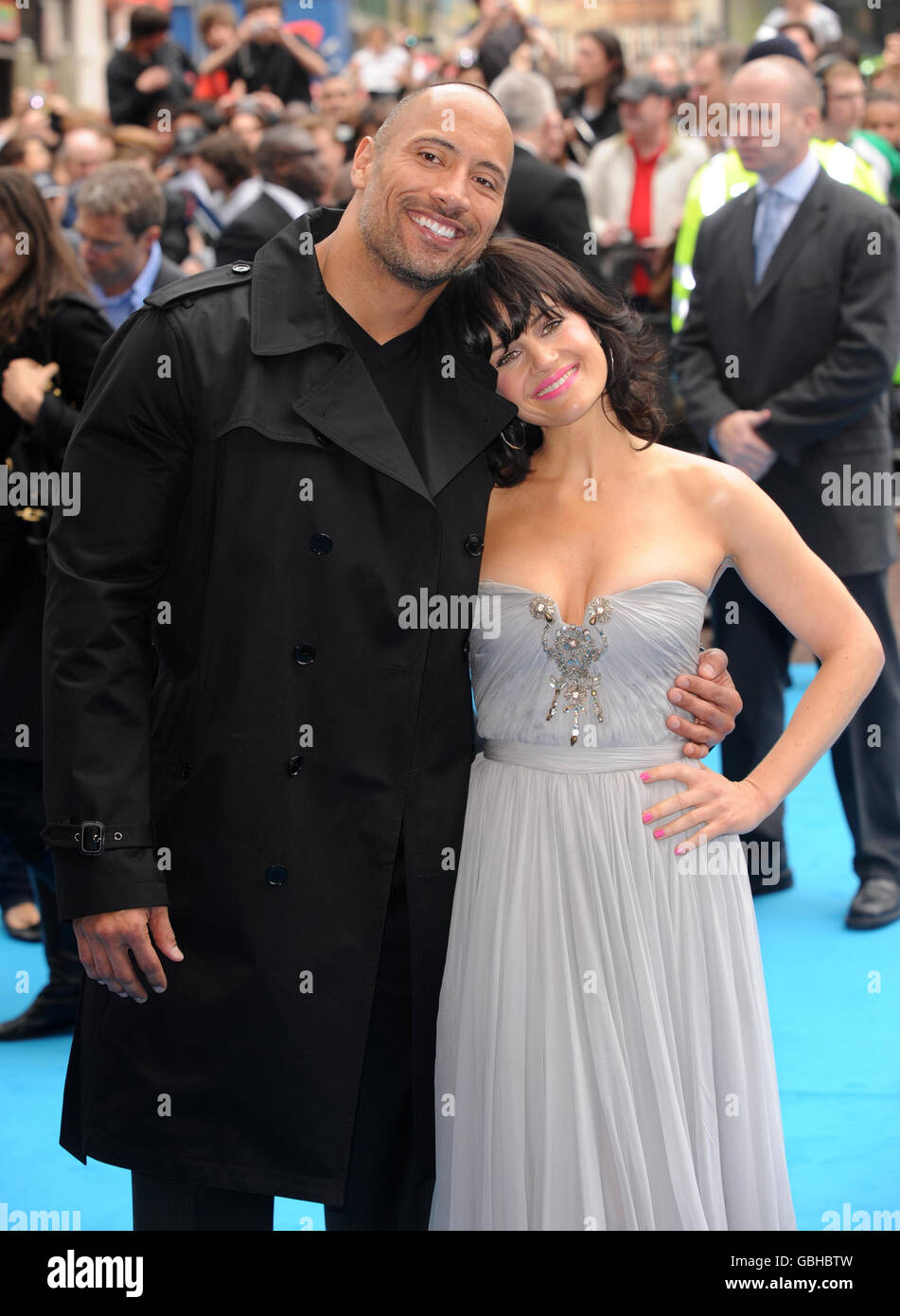Dwayne Johnson (Left) and Carla Gugino arrive for the premiere of Race to Witch Mountain at the Odeon West End in Leicester Square, central London. Stock Photo