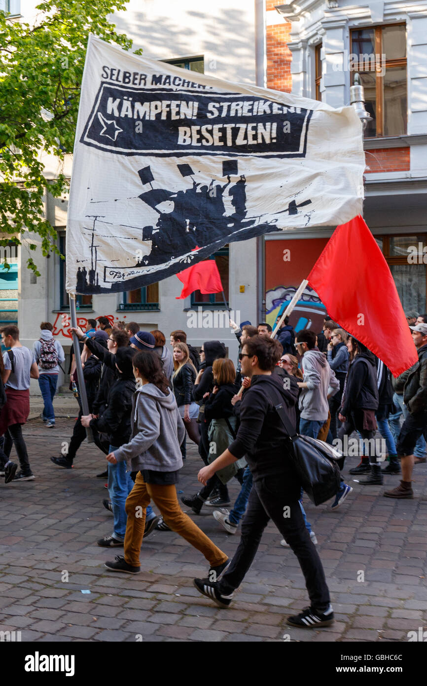 Young protesters in the streets in Berlin, Germany on May Day 2016. Stock Photo