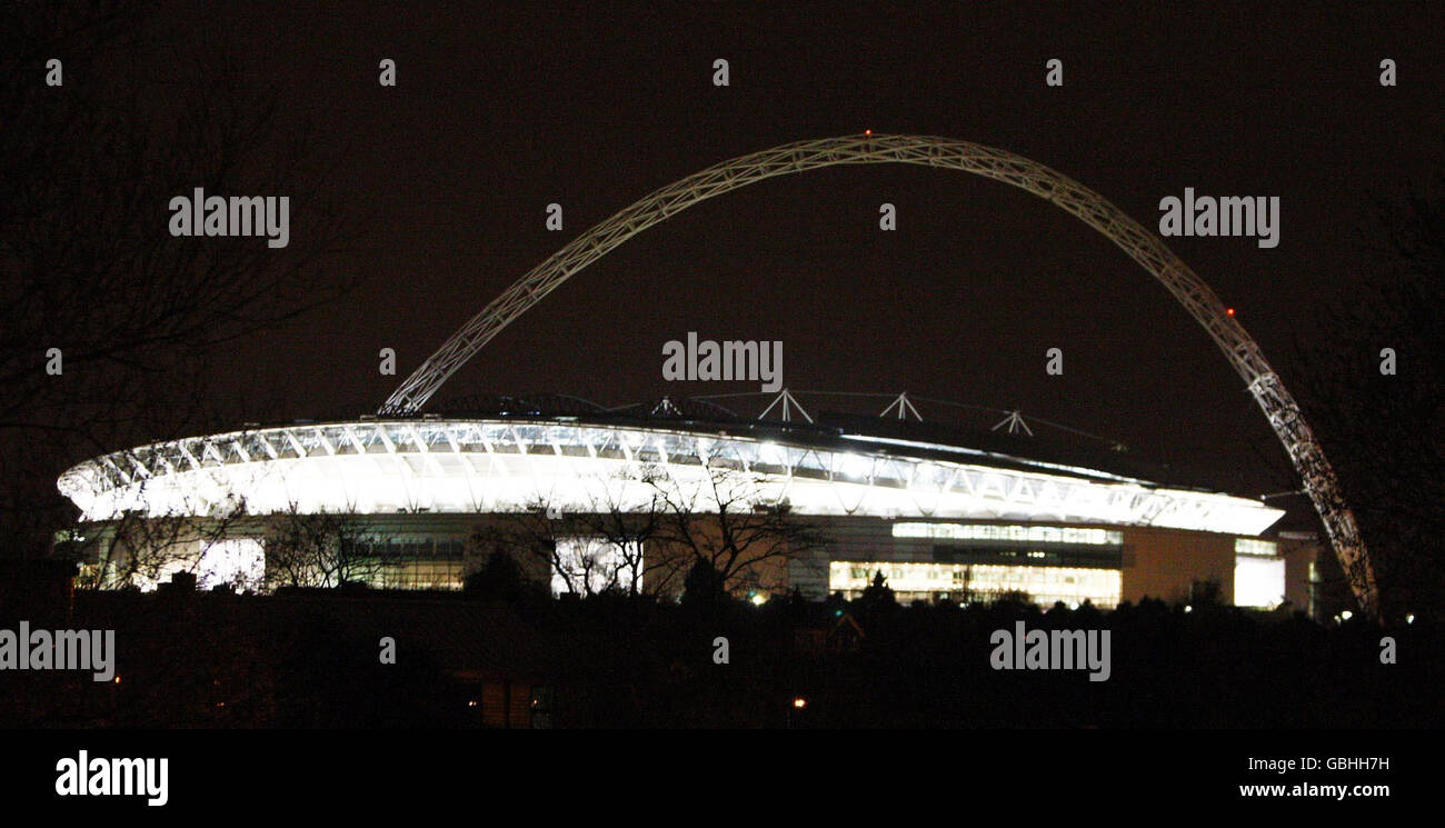 A general view of Wembley Stadium, London, with the arch in the dark after the lights were switched off for Earth Hour. Stock Photo
