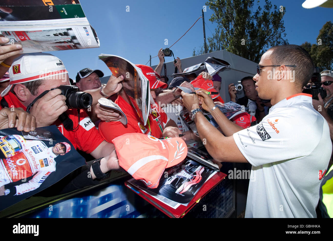 McLaren Mercedes Lewis Hamilton signs autographs before the Australian ...