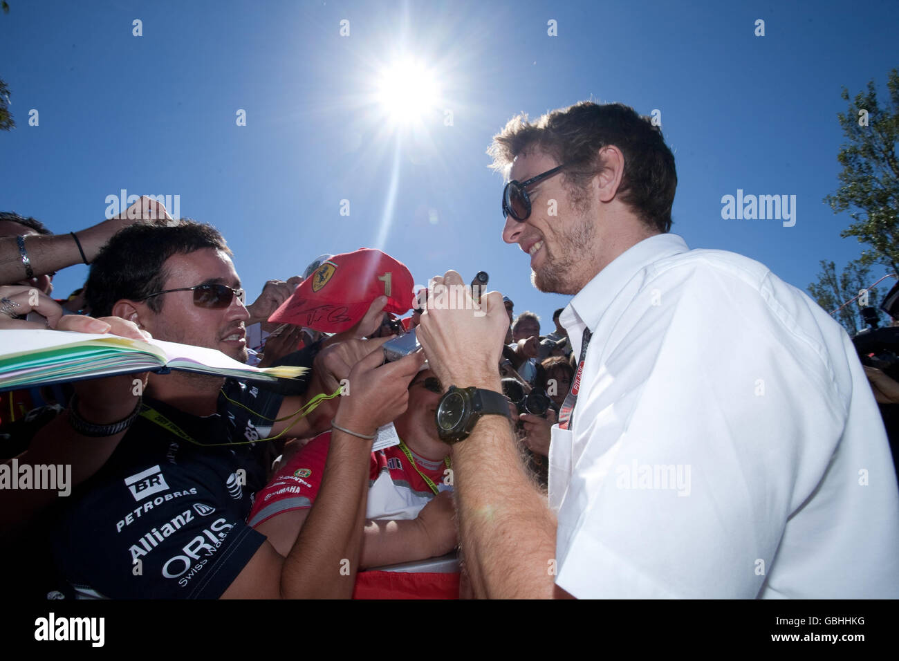 Formula One Motor Racing - Australian Grand Prix - Race - Albert Park - Melbourne. Brawn GP's Jenson Button signs autographs before the Australian Grand Prix at Albert Park, Melbourne, Australia. Stock Photo