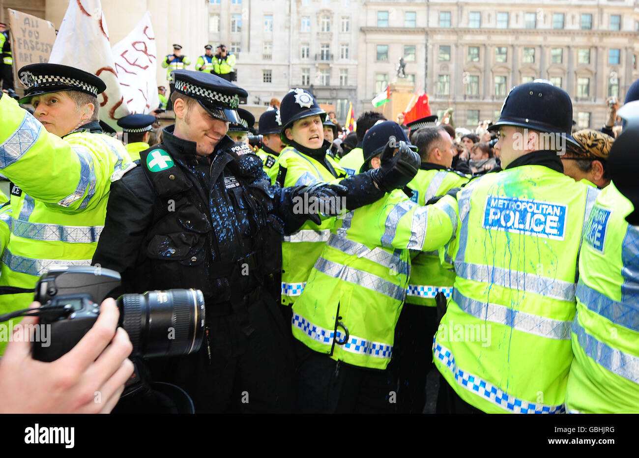 Police control protesters outside the Bank of England, during the G20 protests in the centre of London. Stock Photo