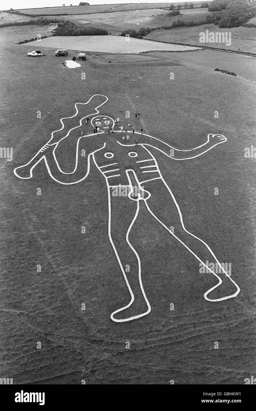 An aerial view of the large outline drawing of a man etched in chalk called the Cerne Abbas Giant. He is Romano-British and 180ft high, brandishing a 120ft club. Stock Photo