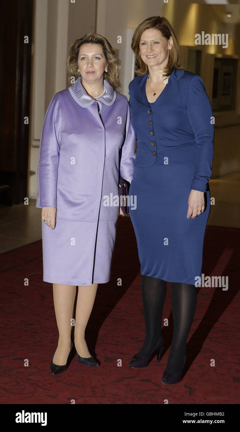 The wife of Britain's Prime Minister Sarah Brown, greets Svetlana Medvedeva, the spouse of the Russian President who joins the G-20 spouses for a visit to the Royal Opera House, Covent Garden, London. Stock Photo