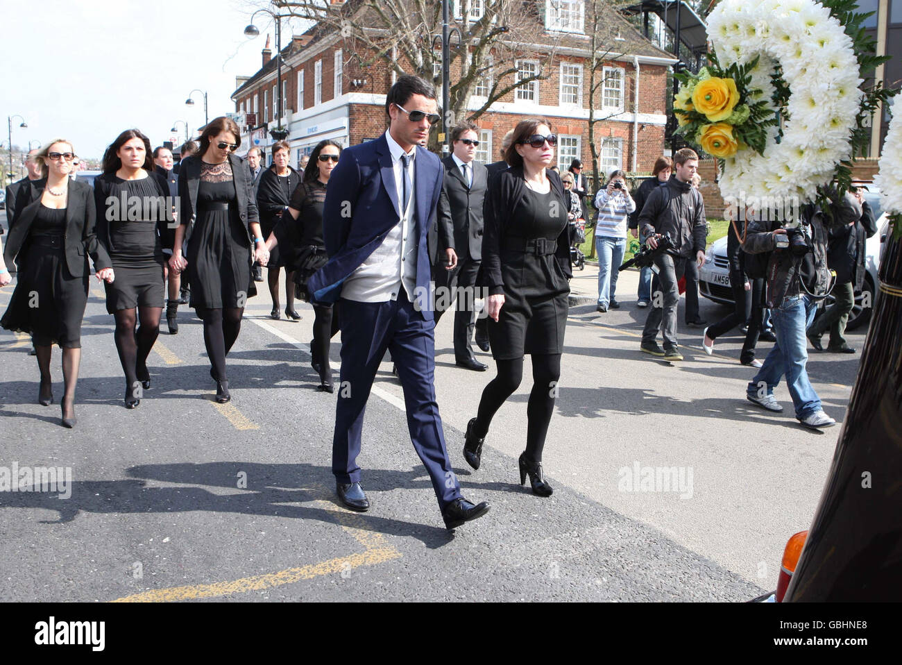 Jack Tweed and Jackiey Budden follow Jade Goody's funeral procession through the centre of Loughton in Essex. Stock Photo